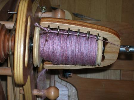 pink wool on bobbin