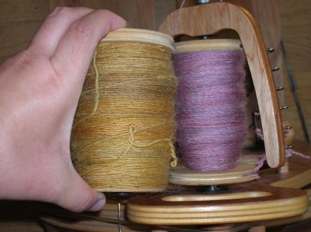 butterscotch & pink wool on bobbins