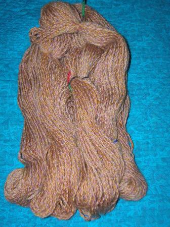 butterscotch and pink cabled yarn