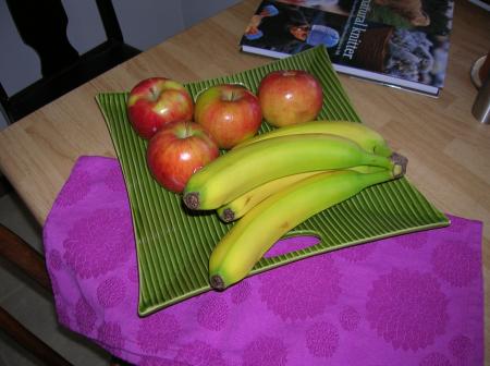 green platter with fruit