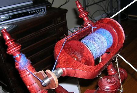 purple-blue yarn on bobbin